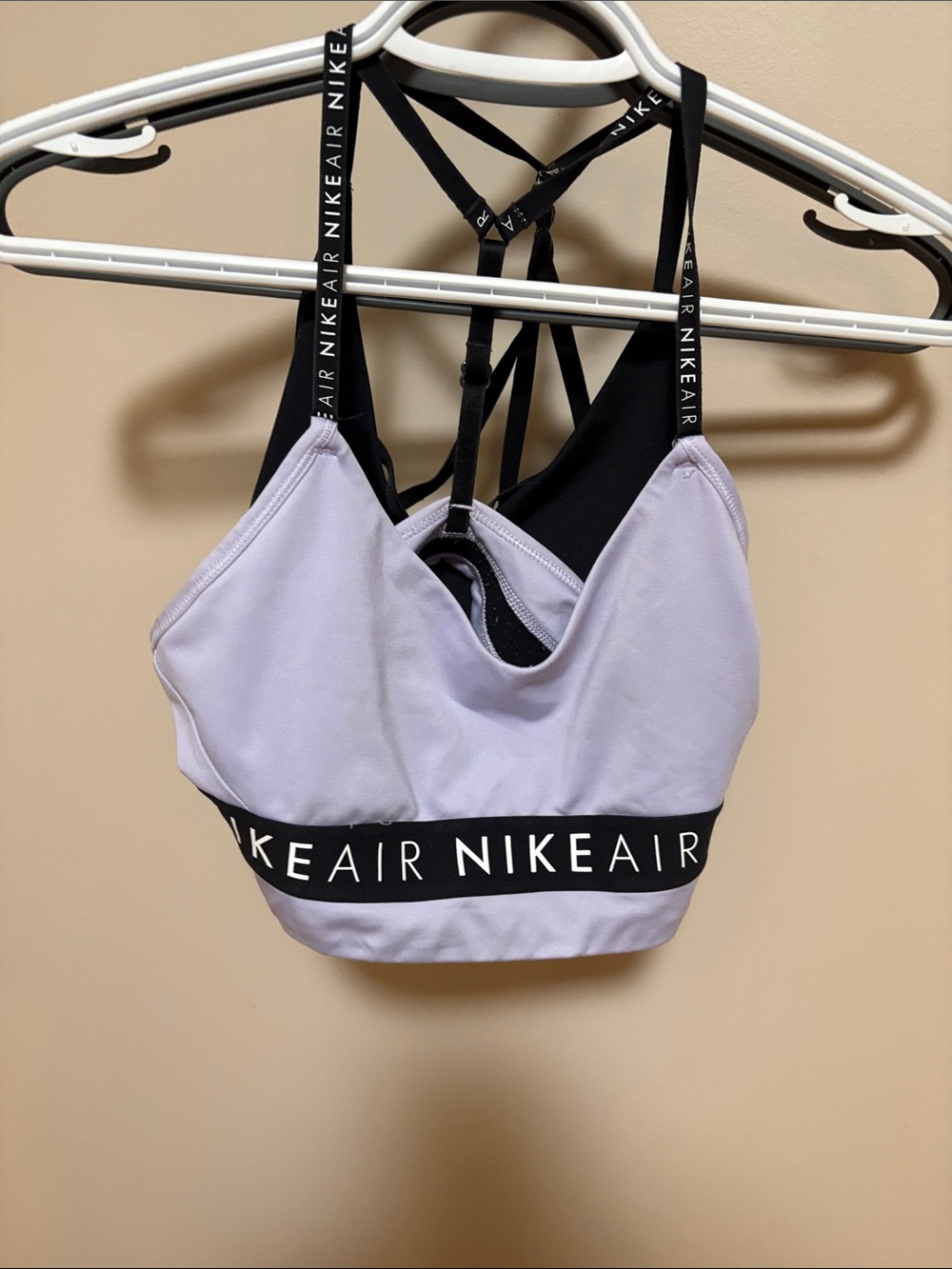 3 Nike sports bras: Lavender, Black, orange sports bras